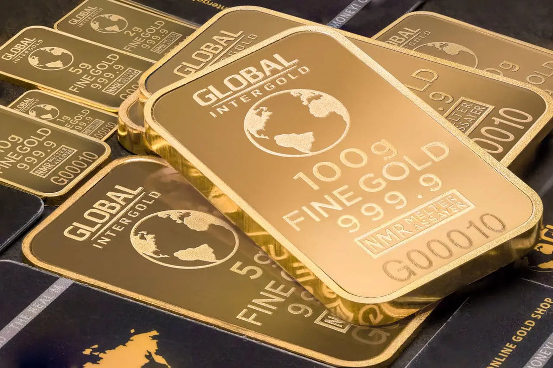 A large stack of flat, 9999 fine gold bullion bars, representing material abundance